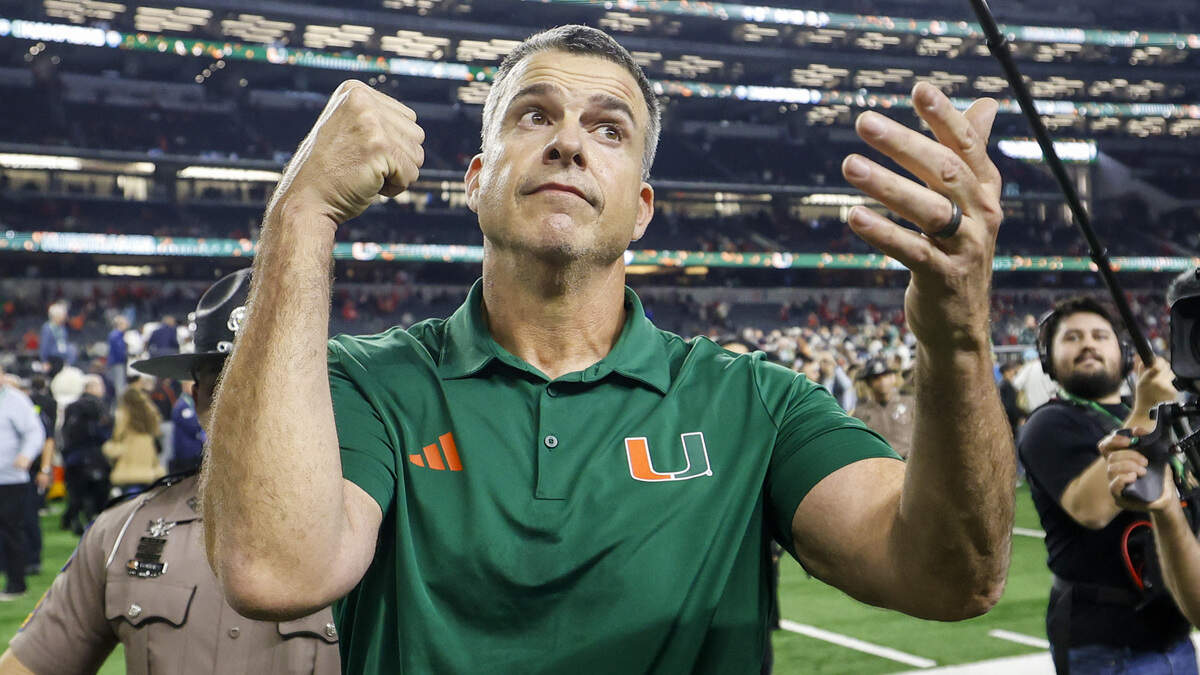 Miami Hurricanes head coach Mario Cristobal reacts after the Canes defeat the Ohio State Buckeyes during the College Football Playoff quarterfinal game in the Cotton Bowl at AT&T Stadium in Arlington, Texas on Wednesday, December 31, 2025.