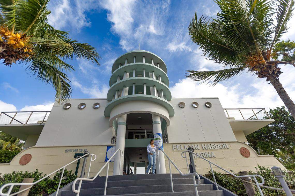 Belkis Gonzalez walks after casting her vote during the general Election in Miami-Dade County at the Pelican Harbor Marina on Tuesday, Nov. 5, 2024, in Miami, Fla.