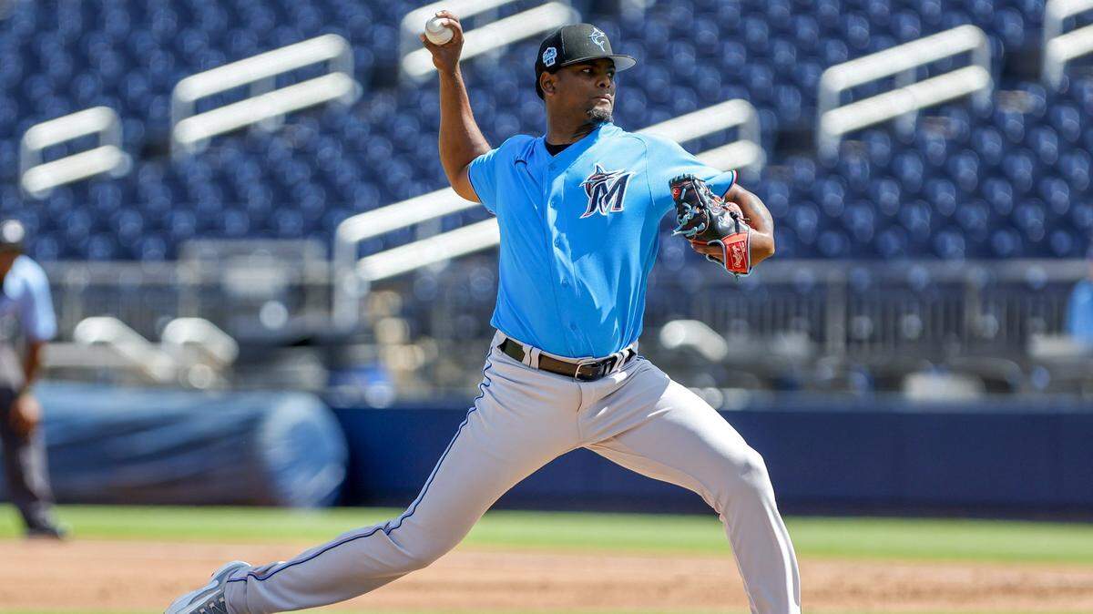 Miami Marlins starting pitcher Edward Cabrera (27) delivers a pitch during the first inning against the Washington Nationals at The Ballpark of the Palm Beaches on March 2, 2023.