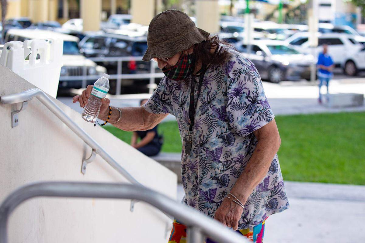 A victim of the Temple Court Apartment fire arrives by trolley at the Jose Marti Gym on 434 SW and 3rd Ave. to receive aid on Monday, June 10, 2024 in Miami, Fla.
