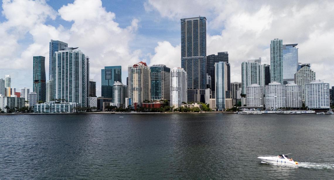 A boat makes its way past Brickell on Friday, July 18, 2025, in Miami.