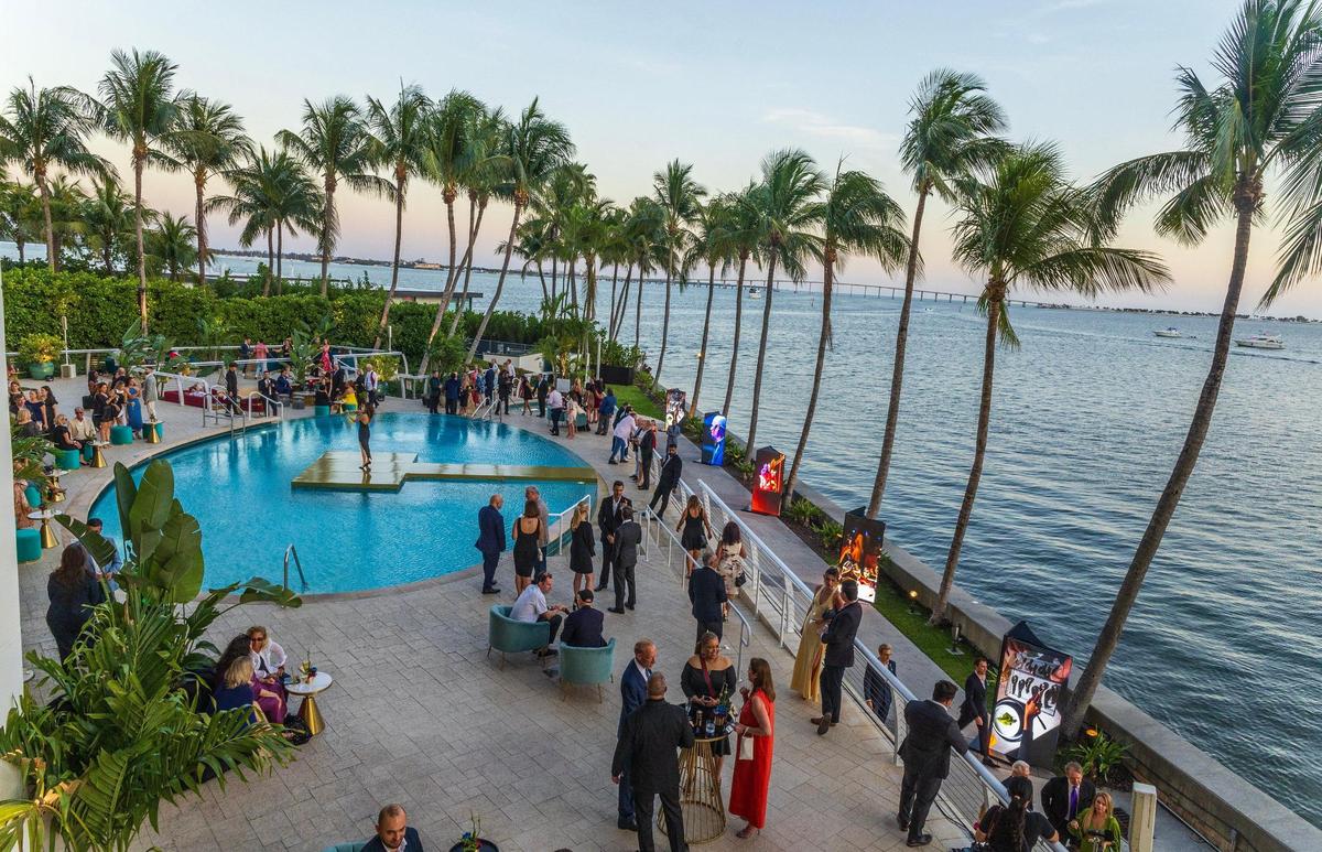 Guests enjoy a live performance around the pool at The Mandarin Oriental, Miami on Thursday May 15, 2025.