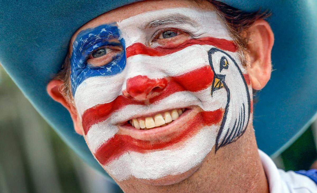 Emcee, Austin Tellam, as residents, family and friends celebrate Independence Day during the 66th Annual Key Biscayne Fourth of July Parade on Key Biscayne, Florida on Friday, July 4, 2025.