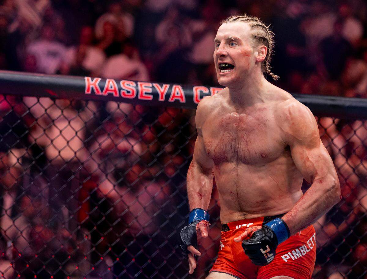 Paddy Pimblett of England celebrates after he defeated Michael Chandler of the United States in their lightweight bout during UFC 314 at the Kaseya Center on Saturday, April 12, 2025, in downtown Miami, Fla.