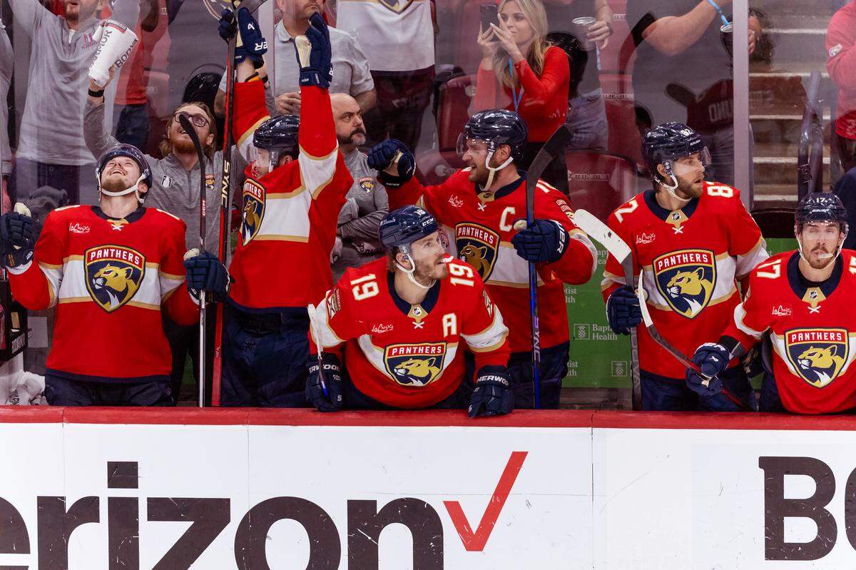 Florida Panthers left wing Matthew Tkachuk (19) and Panthers center Aleksander Barkov (16) celebrate after teammates after their team’s win against the New York Rangers in Game 6 during the Eastern Conference finals of the NHL hockey Stanley Cup playoffs at the Amerant Bank Arena on Saturday, June 1, 2024, in Sunrise, Fla.