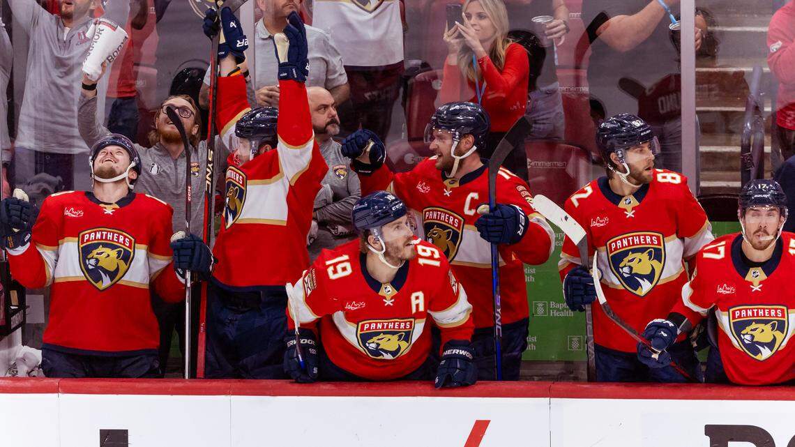 Florida Panthers left wing Matthew Tkachuk (19) and Panthers center Aleksander Barkov (16) celebrate after teammates after their team’s win against the New York Rangers in Game 6 during the Eastern Conference finals of the NHL hockey Stanley Cup playoffs at the Amerant Bank Arena on Saturday, June 1, 2024, in Sunrise, Fla.