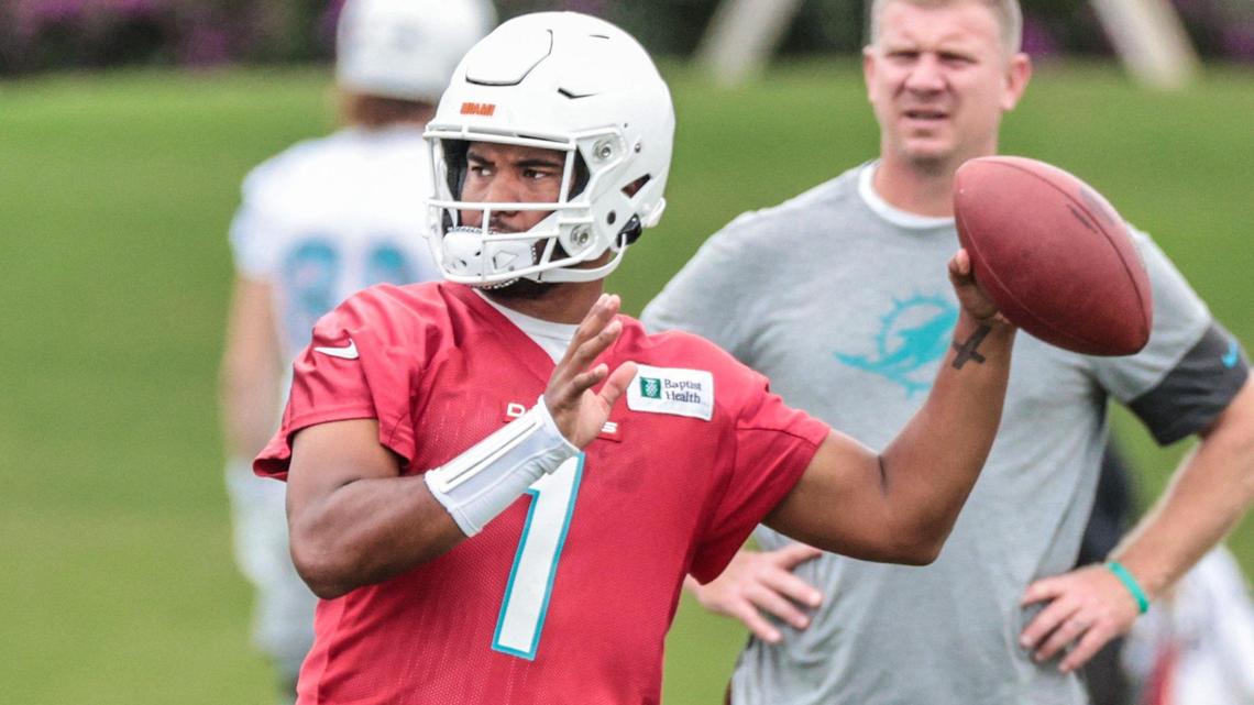 Miami Dolphins quarterback Tua Tagovailoa (1) throws a pass during practice drills at the Baptist Health Training Complex in Miami Gardens on Wednesday, January 5, 2022.