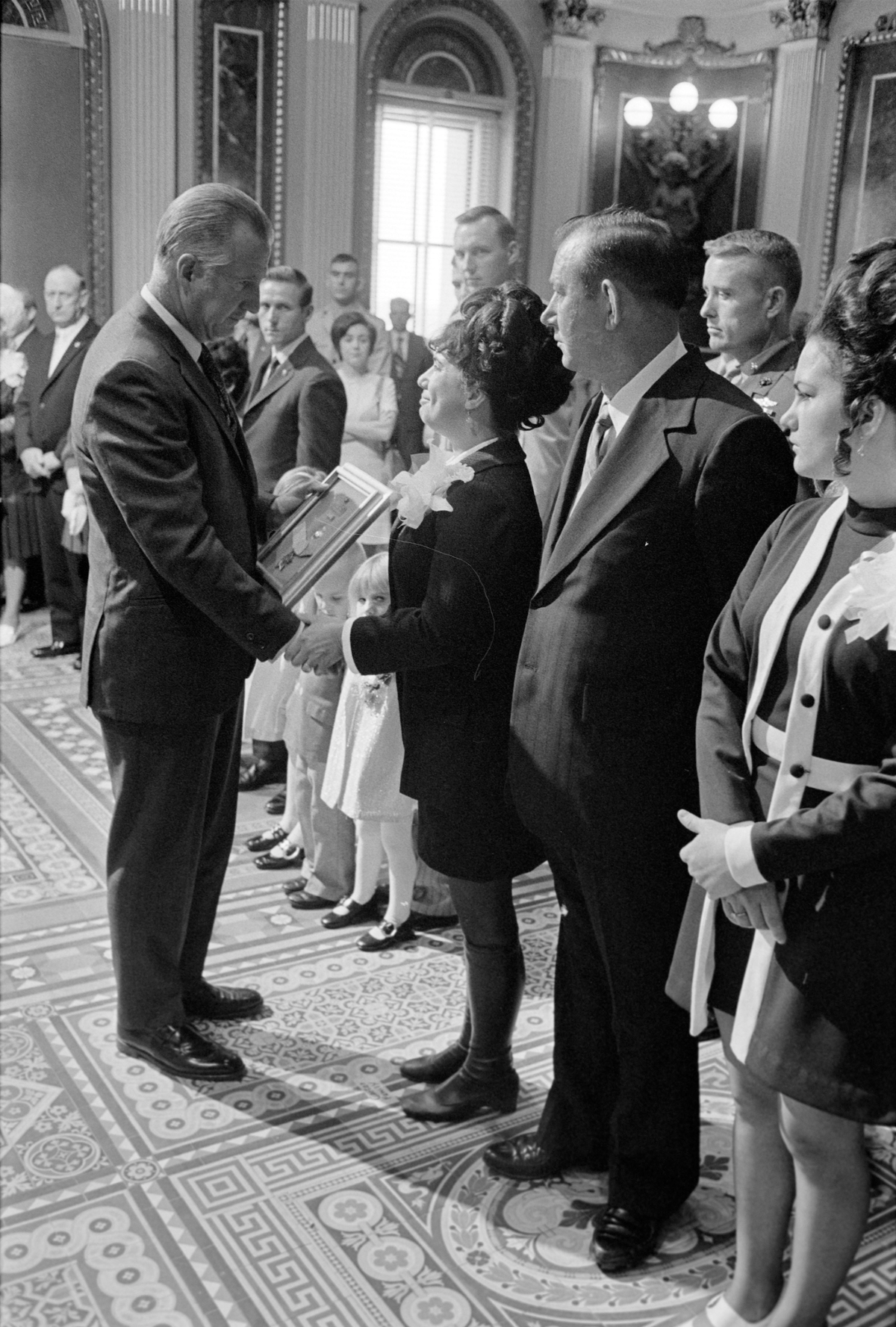 Vice President Spiro Agnew posthumously awards Marine Pvt. First Class Bruce W. Carter’s Medal of Honor, on Sept. 9, 1971, to his mother, Georgie Carter, as husband Gil, and daughter Pam, watch. Carter was buried at Arlington National Cemetery on Wednesday. (COURTESY OF THE WHITE HOUSE PRESS OFFICE)