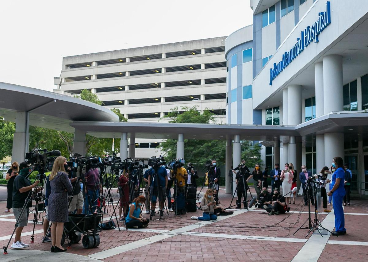 Grace Meatley, a nurse in the intensive care unit, speaks during a press conference outside of Jackson Memorial Hospital in Miami on Tuesday, December 15, 2020. The conference was held after Jackson Memorial Hospital administered doses of the Pfizer BioNTech COVID-19 vaccine to its healthcare workers.