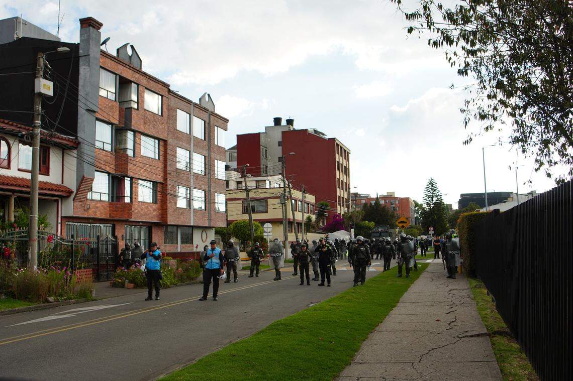 Police in riot gear outside the U.S. Embassy in Bogota., Colombia, on Tuesday Oct. 7, 2025.