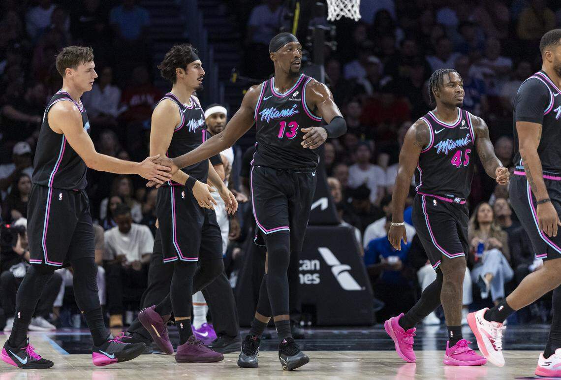 Miami Heat center Bam Adebayo (13) reacts after a play against the Golden State Warriors in the first half of their NBA game at Kaseya Center on Nov. 19, 2025, in Miami.