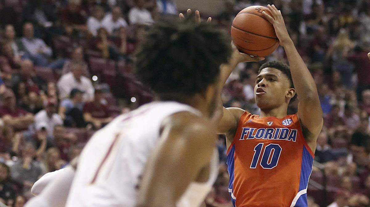 Florida’s Noah Locke shoots against Florida State on Nov. 6, 2018, in Tallahassee.