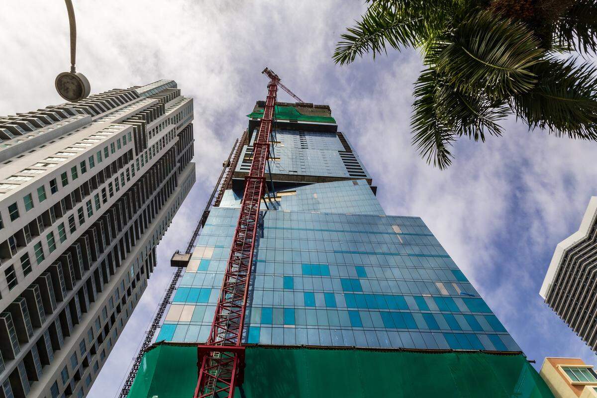 View of the Waldorf Astoria Hotel and Residences (center) a supertall skyscraper currently under construction located at 300 Biscayne Boulevard, in downtown, Miami, Florida. Once completed at 1,049 feet tall and rising 100 stories, it will be Miami's tallest tower AND Miami's first supertall skyscraper, on Wednesday, April 01, 2026.
