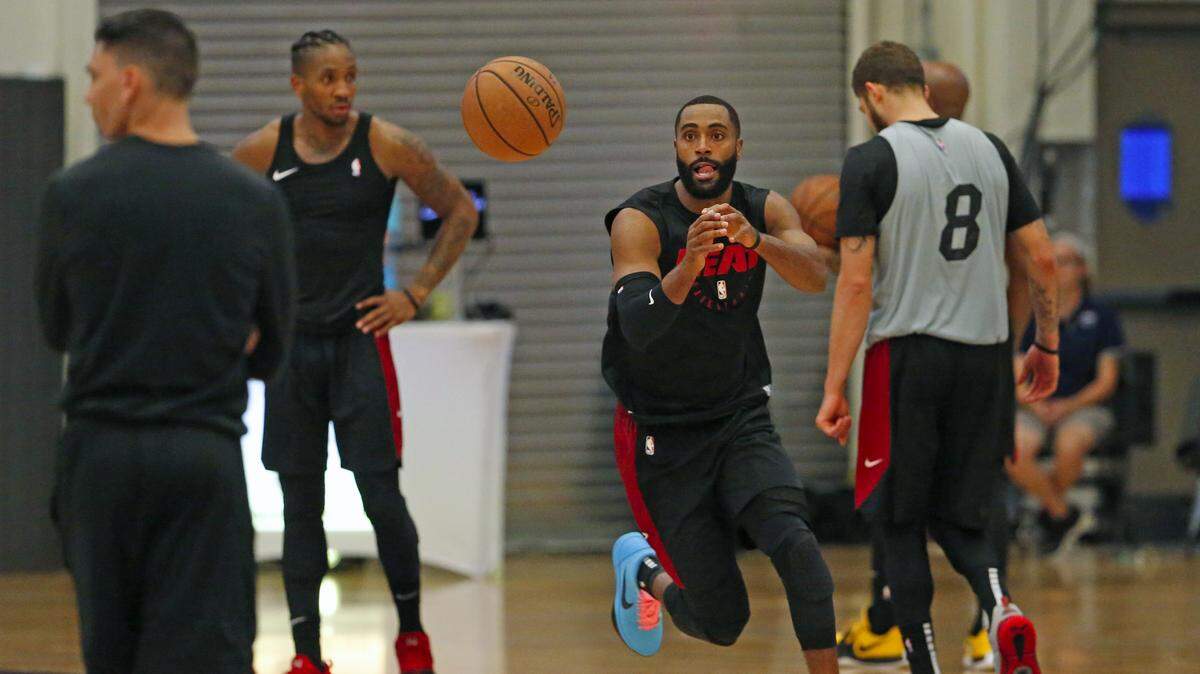 Miami Heat guard Wayne Ellington runs drills during practice on the first day of the Miami Heat training Tuesday at FAU Arena.