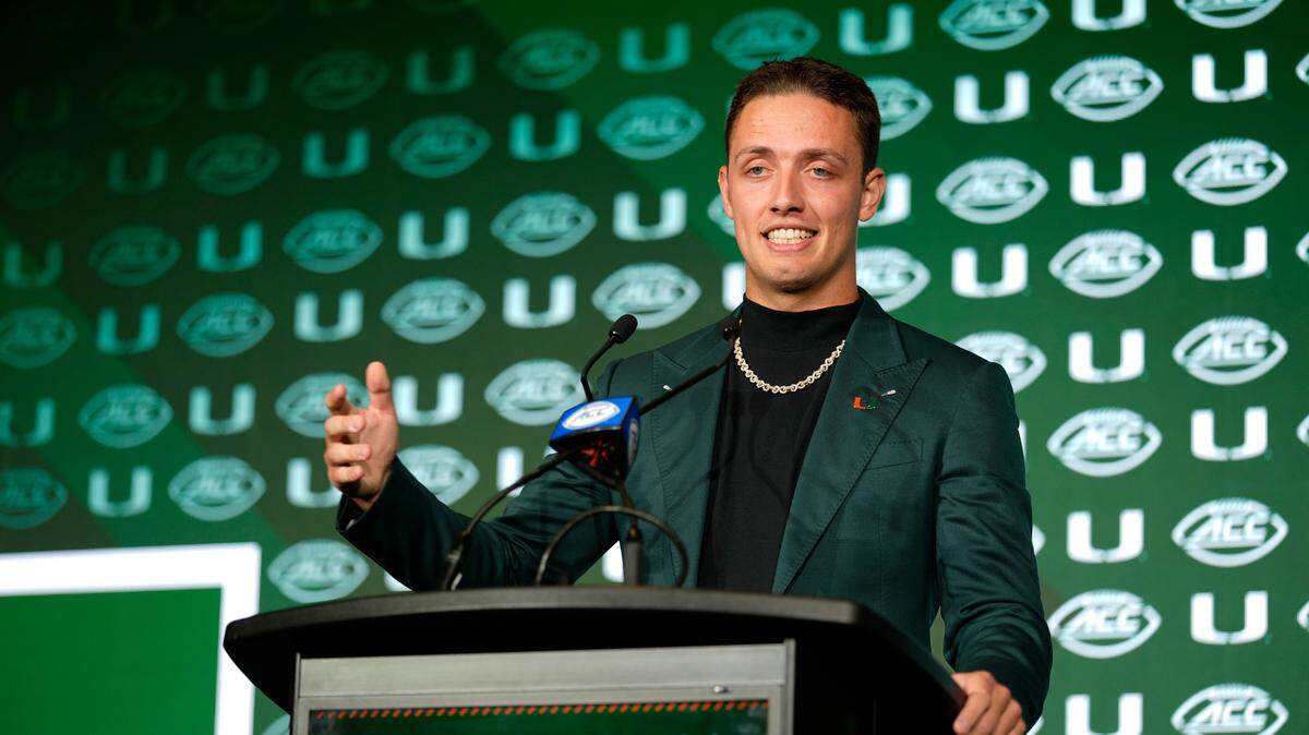 Jul 22, 2025; Charlotte, NC, USA; Miami quarterback Carson Beck answers questions from the media during ACC Media Days at Hilton Charlotte Uptown.