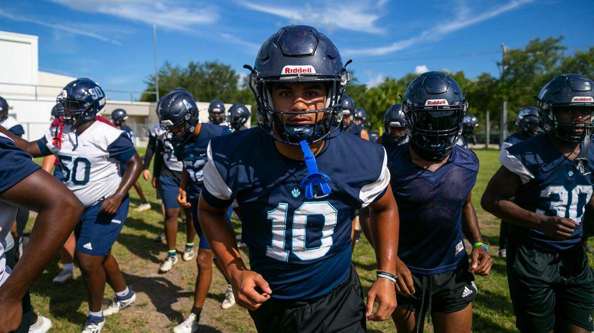 Miami Palmetto Senior High linebacker Gabe Hardman runs drills during a preseason practice at his schools football field on Friday, Aug. 12, 2022, in Pinecrest, Fla.