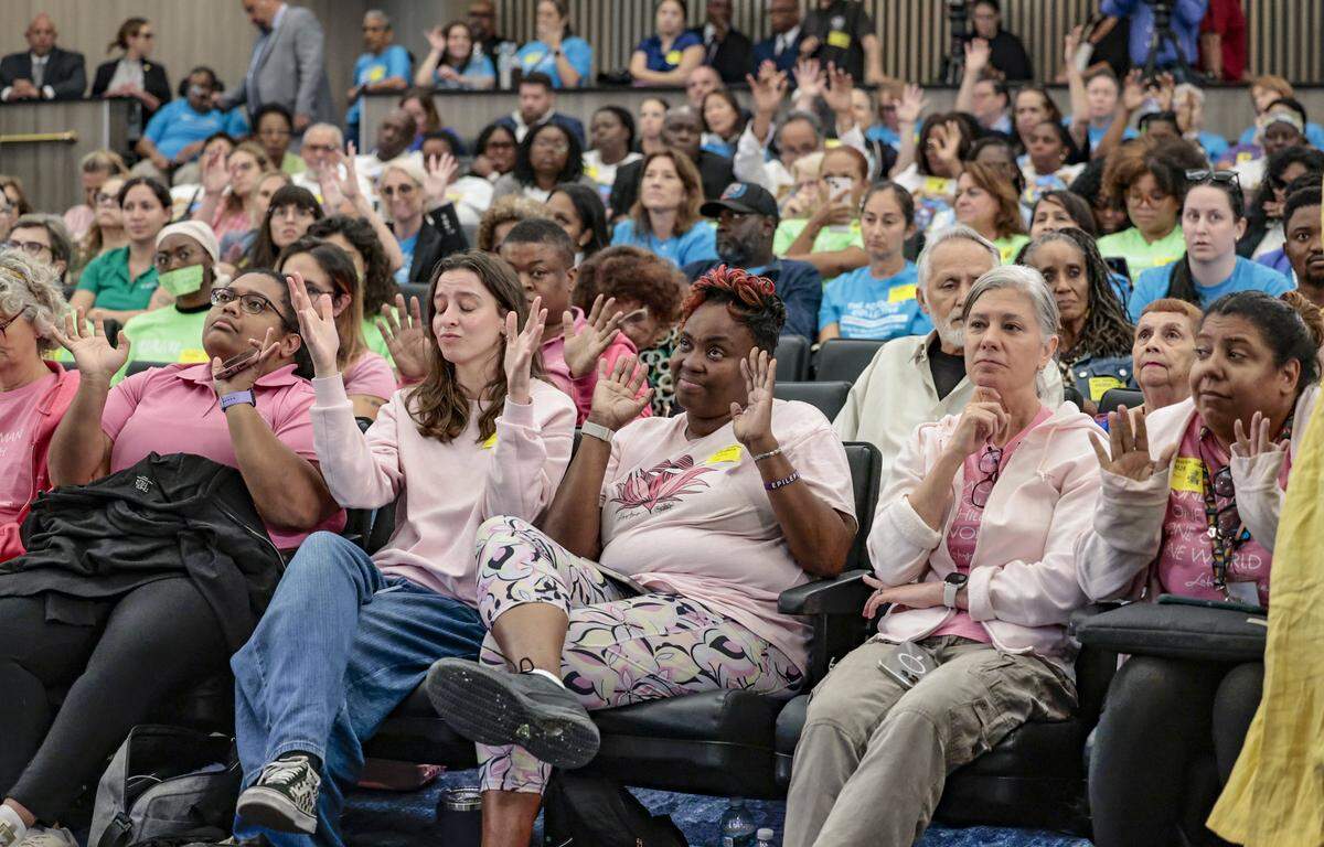 The public reacts to speakers comments regarding protecting public funding during Miami-Dade Mayor Daniella Levine Cava's 2026 budget proposal at the Stephen P. Clark Government Center in Miami, Florida, on Thursday, September 4, 2025. 
