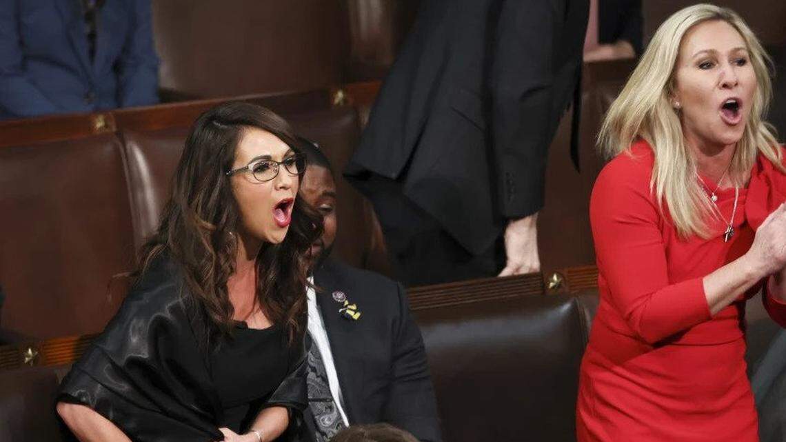 GOP Reps. Lauren Boebert, left, and Marjorie Taylor Greene hoot and holler during President Biden’s State of the Union address in March.
