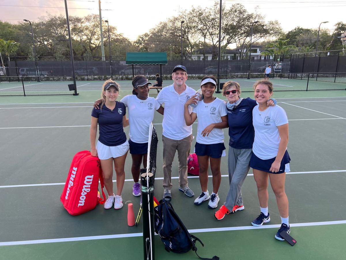 Members of the Riviera Prep girls’ tennis team with coach Jane Forman