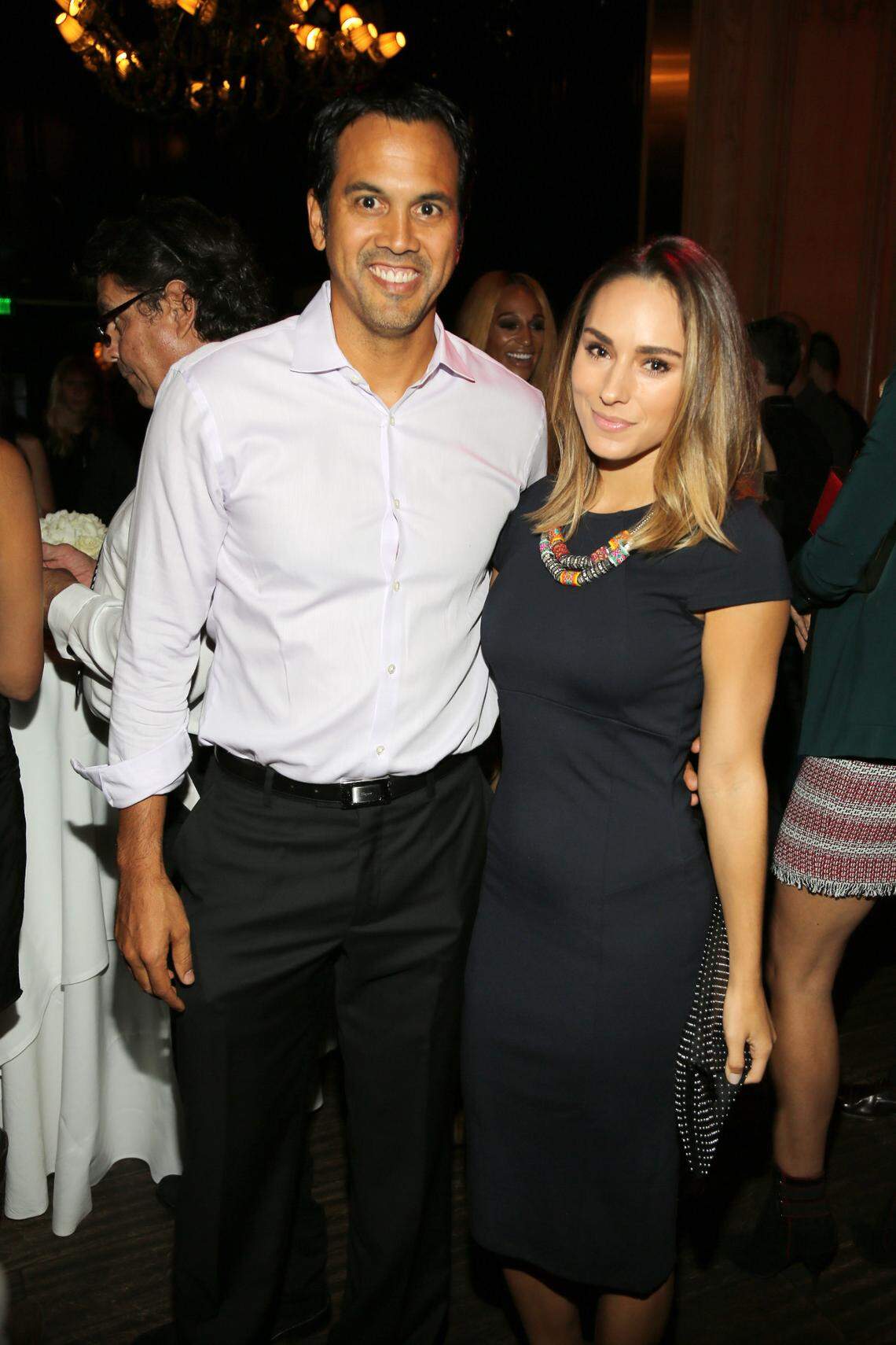 :Head Coach of the Miami Heat, Erik Spoelstra (L) and Nikki Sapp attend at DuJour Magazine’s Jason Binn & The Forge’s Shareef Malnik welcome Amar’e Stoudemire to the Miami Heat presented by Philip Stein at The Forge Restaurant on September 24, 2015 in Miami, Florida.