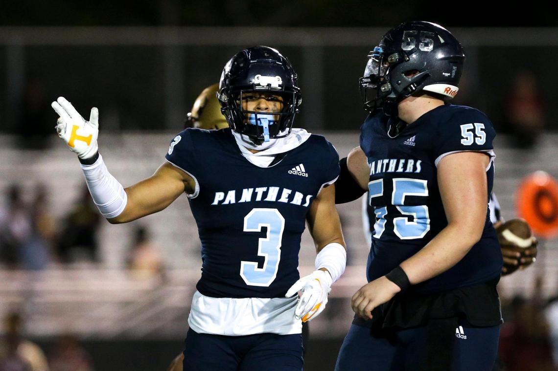 Palmetto Panthers wide receiver Derrick Bohler (3) celebrates with tackle Aiden Martinez (55) after running with the football against the Coconut Creek Cougars at Miami Southridge Senior High School in South Miami, Florida, Thursday, November 3, 2022.