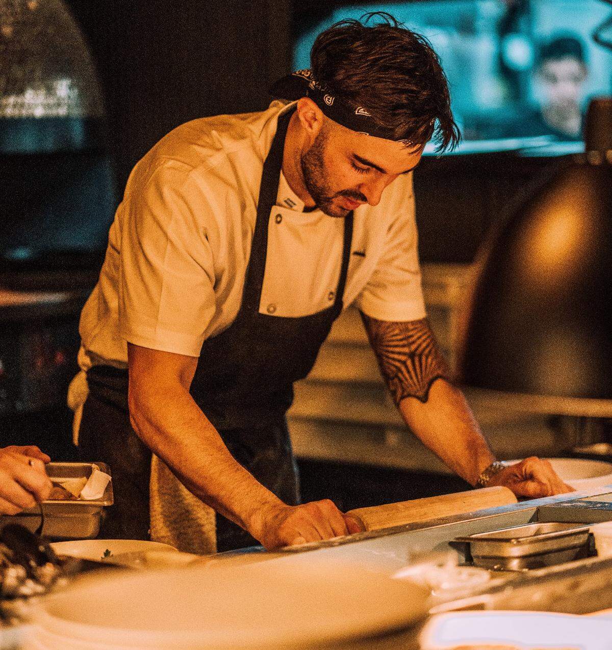 Chef Calvin Daniele works in the kitchen at Log restaurant in Wynwood.