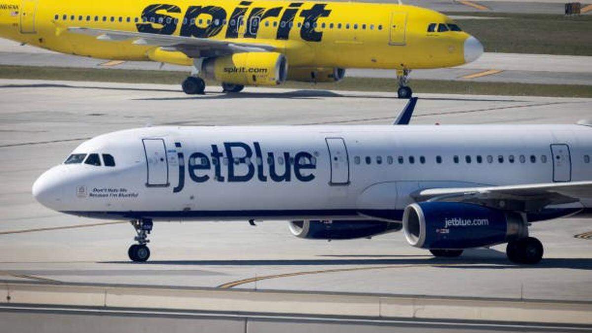 A JetBlue Airways plane sits on the tarmac at the Fort Lauderdale-Hollywood International Airport on Jan. 31, 2024