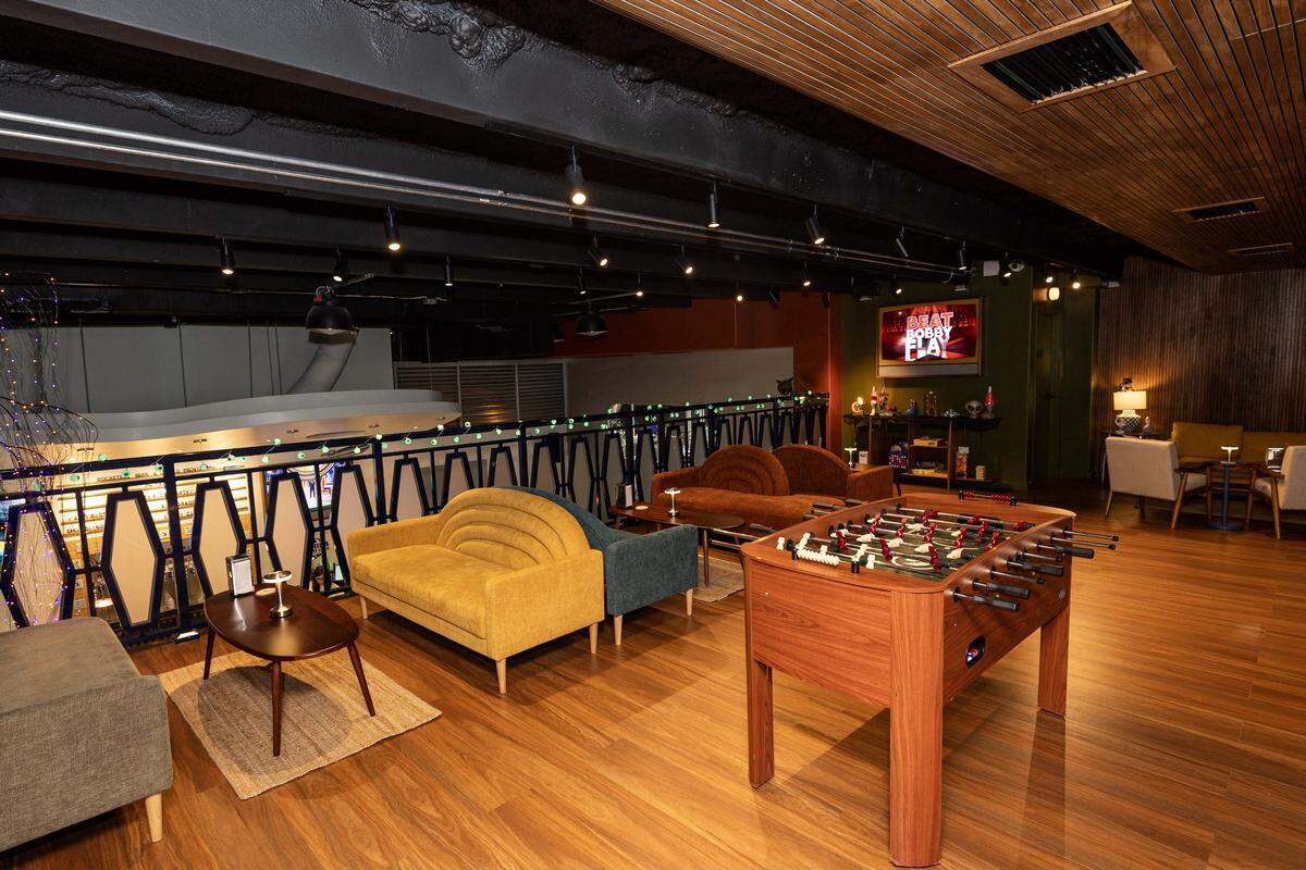 An interior shot of the upstairs lunge area at Rocketeer Beer & Liquid Provisions on Monday, October 13, 2025, in Miami, Fla.