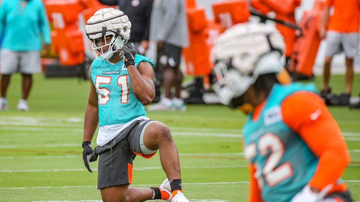 Miami Dolphins Tindall Channing (51) stretches during Dolphins Rookie Minicamp at the Baptist Health Training Complex in Miami Gardens on Friday, May 13, 2022.