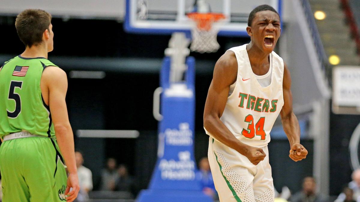 Blanche Ely HS Colby King (34) screams after an important three-pointer in the fourth quarter as they play Windermere HS in the 8A Boy’s Semi-Finals State Basketball Championships at the RP Funding Center in Lakeland, Florida, Friday, March, 8, 2019.
