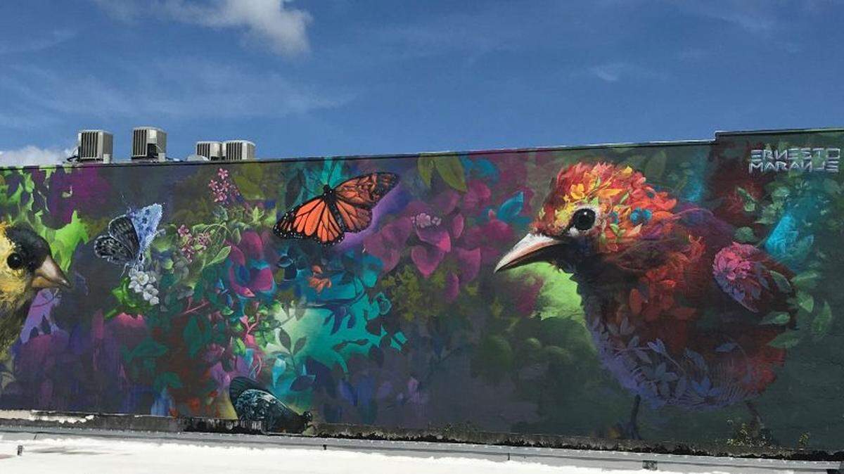A mural by Miami-based artist Ernesto Maranje adorns Liberty Gardens Park in North Miami, touching on themes of restoring native tree and plant habitats.