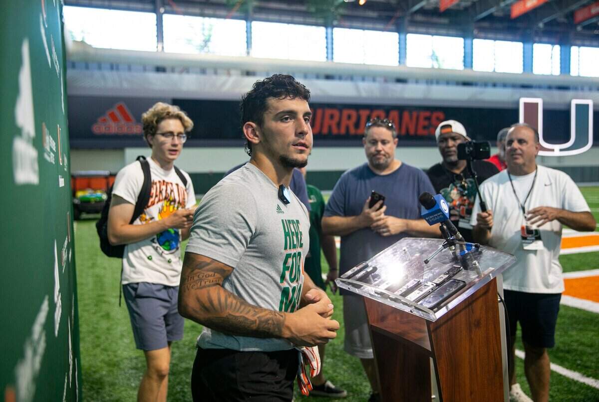 Miami Hurricanes wide receiver Xavier Restrepo (7) speaks at a press conference after running drills at the University of Miamis Greentree Practice Fields on Monday, Aug. 15, 2022, in Coral Gables, Fla.