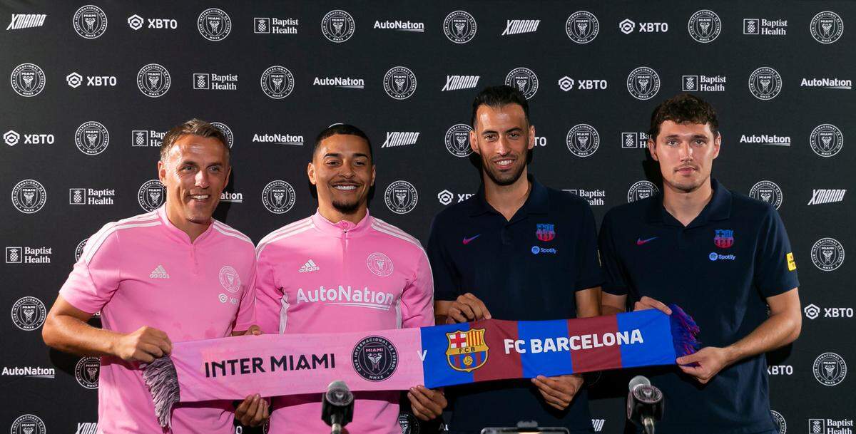 From left to right: Inter Miami Head Coach Phil Neville, Inter Miami midfielder Gregore Silva (26), FC Barcelona midfielder Sergio Busquets (5), and FC Barcelona defender Andreas Christensen attend a press conference before the start of an open training session in advance of their friendly soccer match at DRV PNK Stadium on Monday, July 18, 2022.