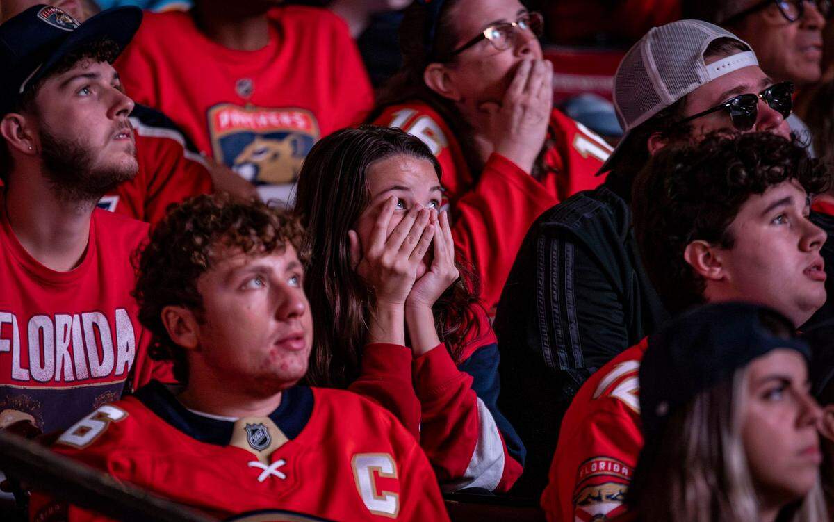 Florida Panthers fan reacts as she watches her team play against the Edmonton Oilers in Game 4 of the NHL Stanley Cup Finals at the Amerant Bank Arena.