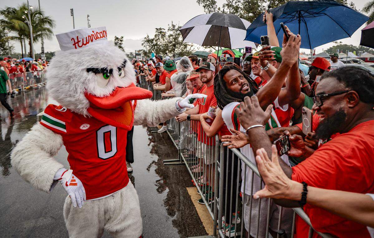 Sebastian the Ibis greets Canes fans outside Hard Rock Stadium before the start of the NCAA football game between the Miami Hurricanes and the Notre Dame Fighting Irish in Miami Gardens, Florida, on Sunday, August 31, 2025. 