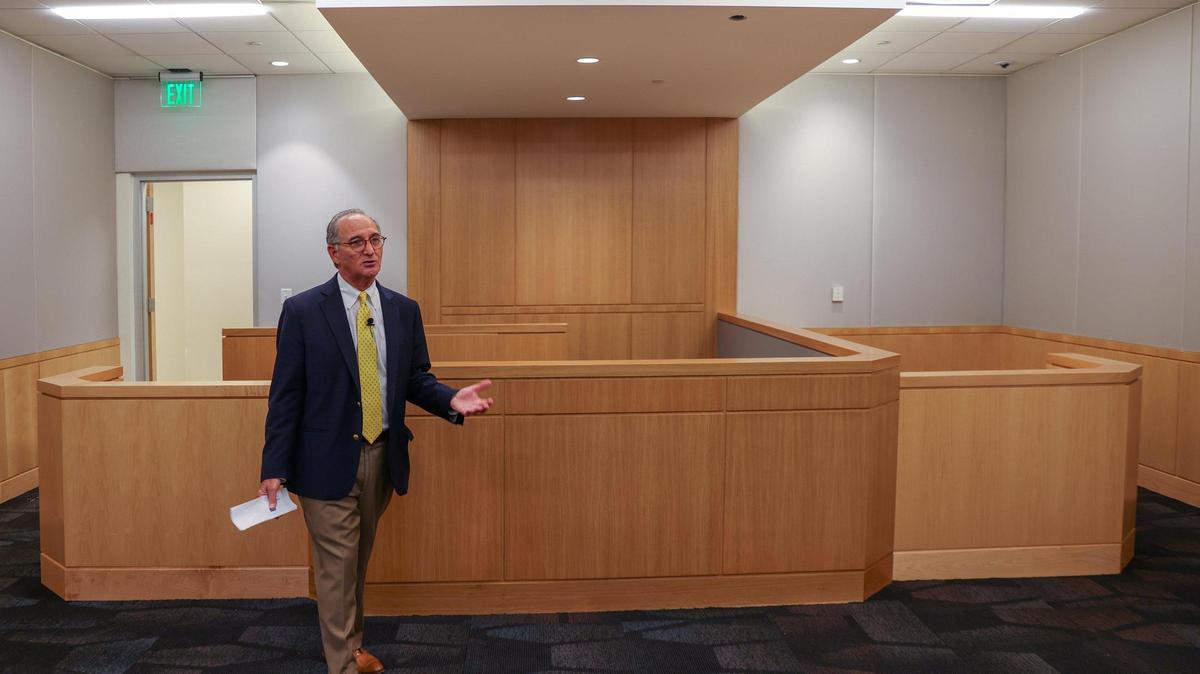 County judge Steven Leifman leads the group into the onsite courtroom while giving a tour to a group of business and civic leaders of the newly renovated and designed Miami Center for Mental Health and Recovery for inmates on Thursday, August 24, 2023 in Miami, Florida.