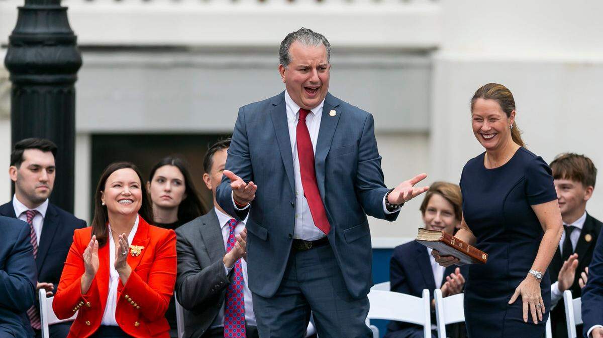 Chief Financial Officer Jimmy Patronis, center, reacts during his inauguration ceremony on Tuesday, Jan. 3, 2023, in Tallahassee, Florida.