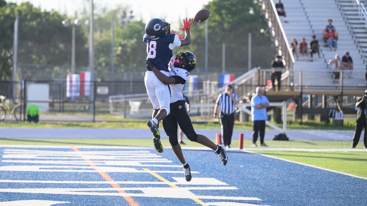 Columbus High School wide receiver Khamari Marceus (8) scores a touchdown during the game at Tropical Park on Friday, Nov. 29, 2024 in Miami, Fla.