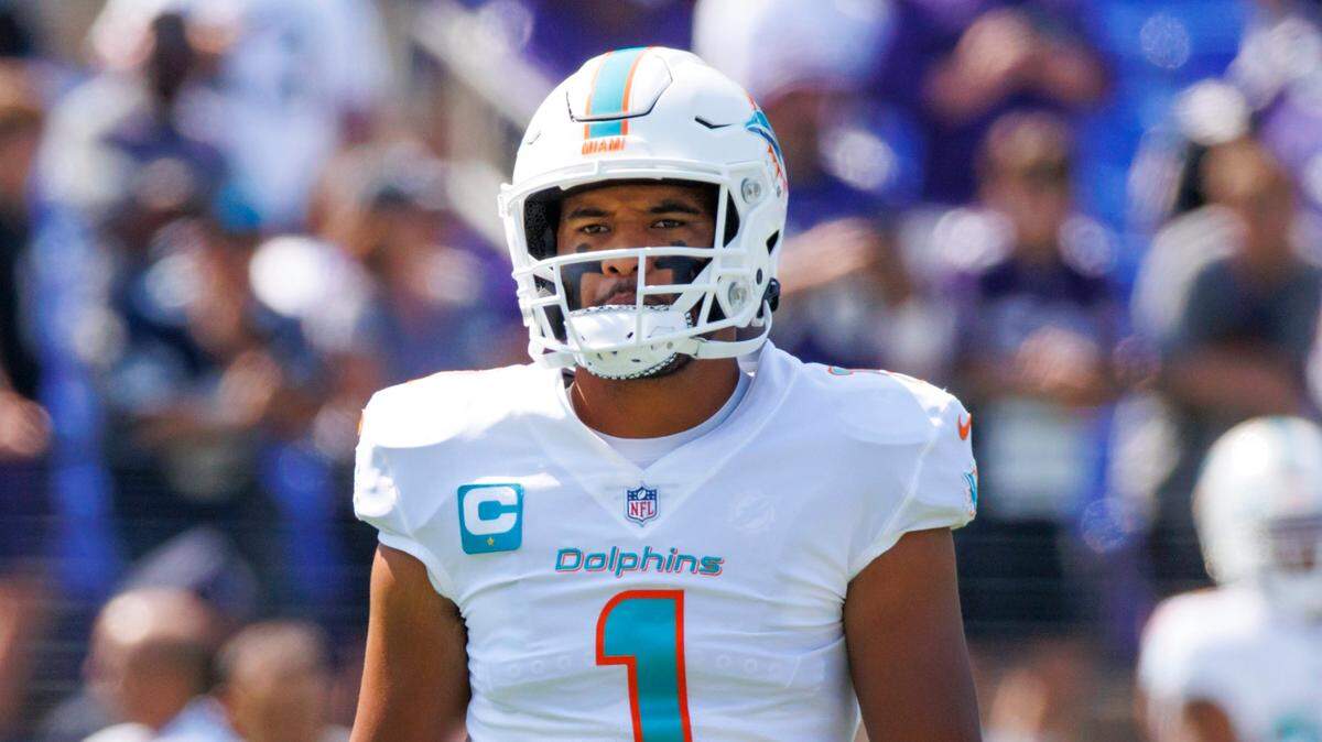 Miami Dolphins quarterback Tua Tagovailoa (1) looks on before the start of an NFL football game against the Baltimore Ravens at M&T Bank Stadium on Sunday, September 18, 2022 in Baltimore, MD.