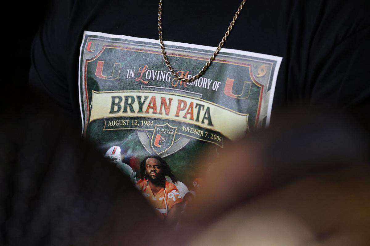 POOL PHOTO: Friends and family of Bryan Pata, appear in court as a few wear memorial t-shirt of Pata as Rashaun Jones, who is accused of killing his University of Miami football teammate Bryan Pata in 2006, sat with defense attorneys in Judge Cristina Miranda Courtroom 4-1 at the Richard E. Gerstein Justice Building in Miami, FL, on Monday, March 2, 2026.