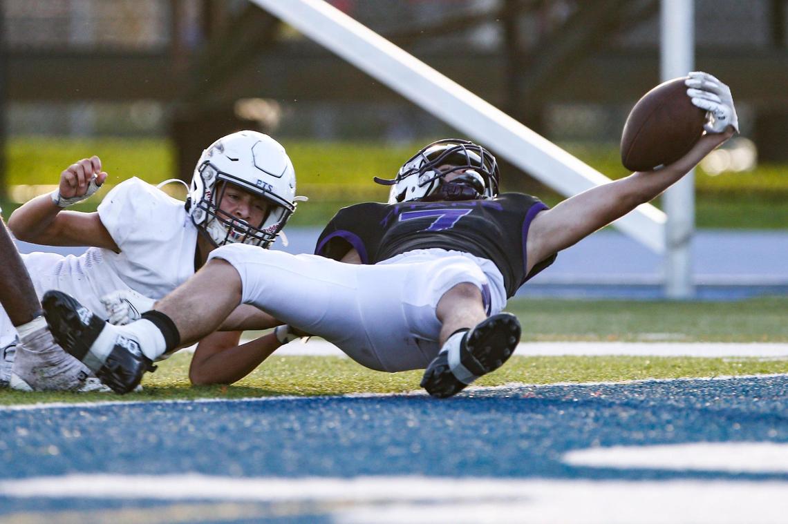 True North wide receiver Jasen “Jroc” Lopez (7) scores a touchdown during the third quarter of a high school football playoff game against Palmer Trinity at Tropical Park in Miami, Florida, Friday, November 25, 2022.