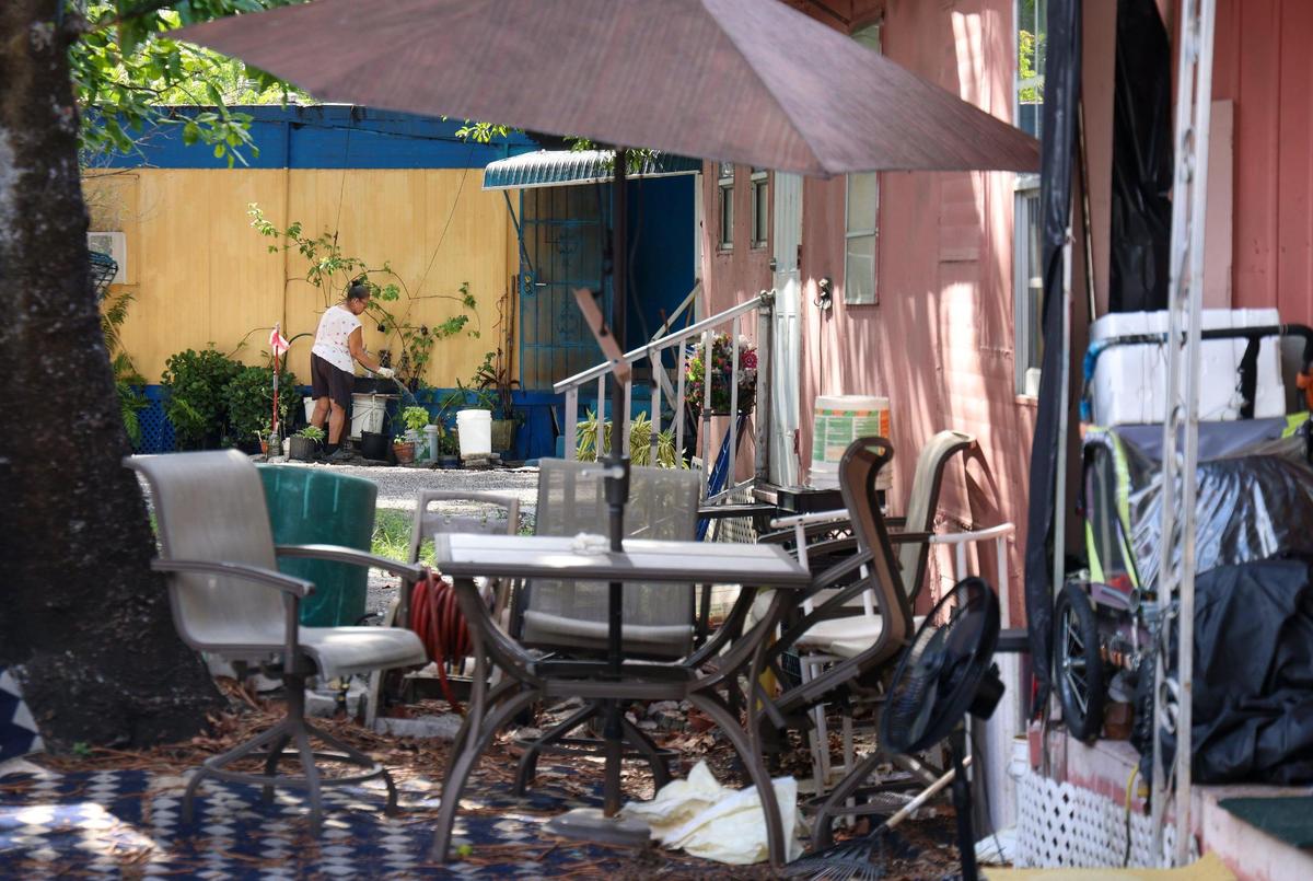 Brownsville’s Blue Belle trailer park is in the area that the City of Hialeah was considering annexing from the Brownsville neighborhood in 2023. A resident waters her plants outside her trailer on Thursday, May 11, 2023.