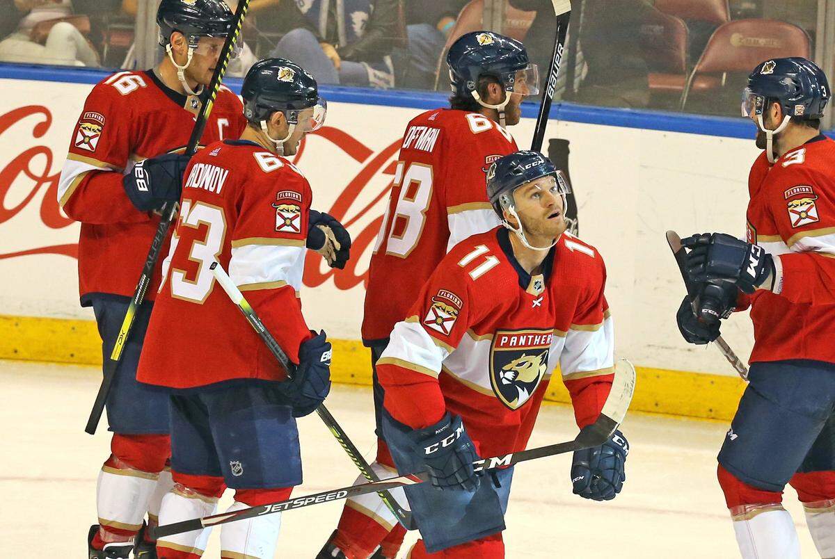 Florida Panthers Jonathan Huberdeau (11) looks up at the big screens as he becomes the Panthers all time high scorer as they play the Toronto Maple Leafs at the BB&T Center in Sunrise, Florida, Sunday, January, 12, 2020.