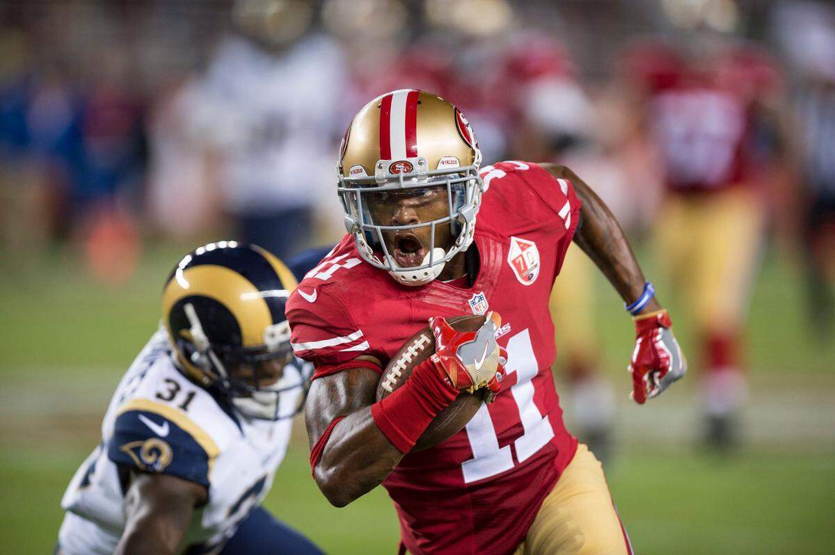 San Francisco 49ers wide receiver Quinton Patton (11) runs past Los Angeles Rams strong safety Maurice Alexander (31) after a catch in the fourth quarter on Monday evening between the San Francisco 49ers and Los Angeles Rams at Levi Stadium in Santa Clara on September 12, 2016