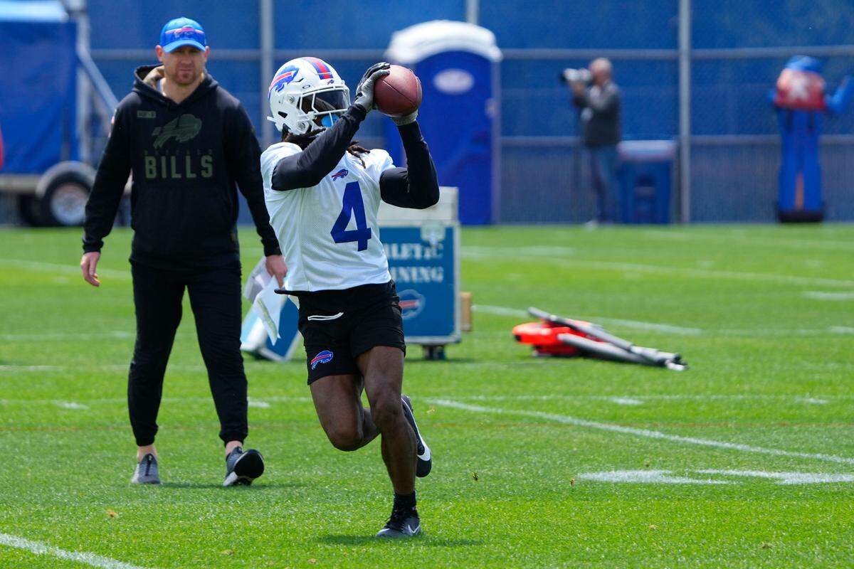 Jun 13, 2023; Buffalo, NY, USA; Buffalo Bills running back James Cook (4) makes a catch during Buffalo Bills Minicamp. Mandatory Credit: Gregory Fisher-USA TODAY Sports