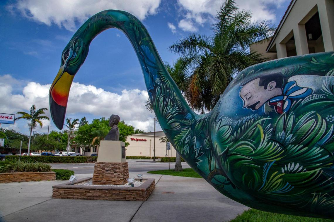 A flamingo statue oversees the bust of Cuban poet and hero Jose Marti displayed at the Walker Community Center in Hialeah.