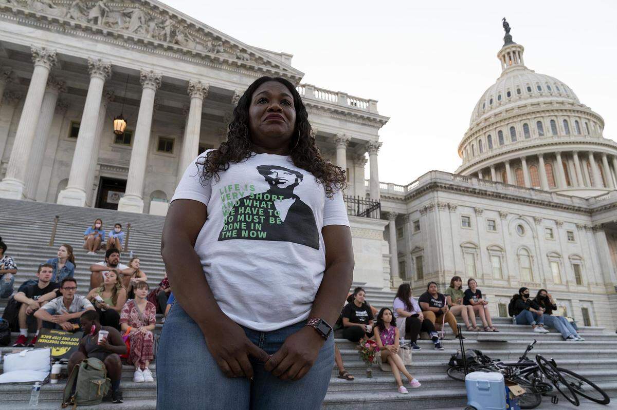 Rep. Cori Bush, D-Mo., along with supporters camps outside the U.S. Capitol, in Washington, Monday, Aug. 2, 2021, as anger and frustration has mounted in Congress after a nationwide eviction moratorium expired at midnight Saturday. (AP Photo/Jose Luis Magana)