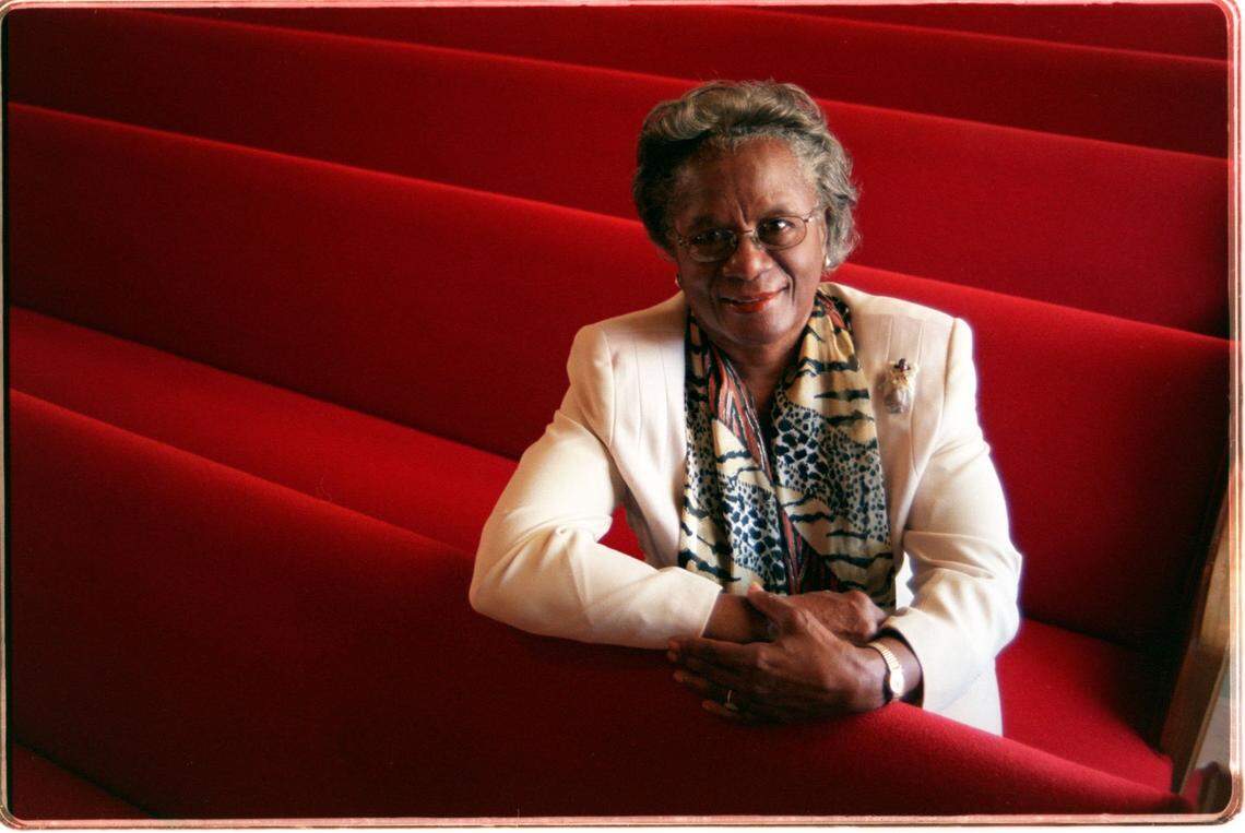 Thelma Anderson Gibson, who's grandparents were founding members of the Christ Episcopal Church, sits in the chapel of the church.