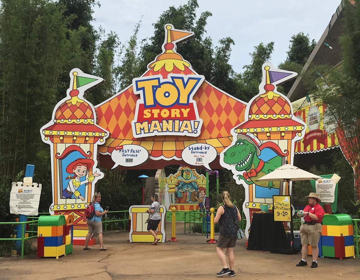 The entrance to Toy Story Mania! moved around the corner, across from Slinky Dog Dash, and a third track was added.