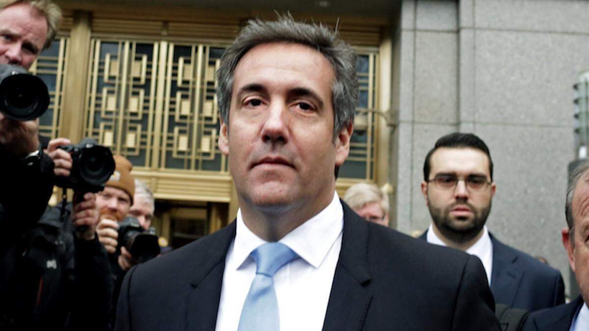 Michael Cohen leaves federal court in New York City after a hearing in April. Tuesday, he implicated President Trump, then a candidate,  in a scheme to pay hush money to two women with whom he had had affairs.